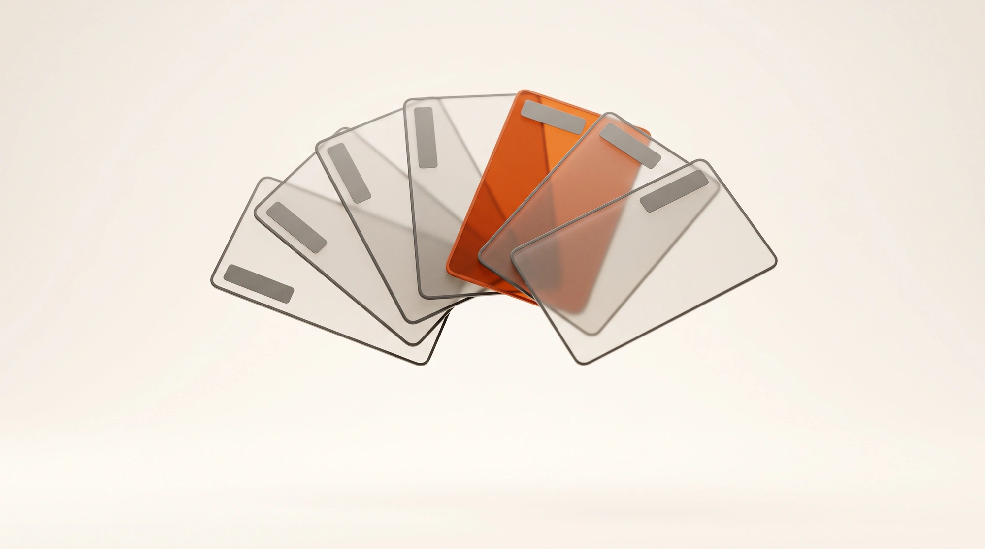 An abstract fan of thin frosted glass cards, one accented in ember.